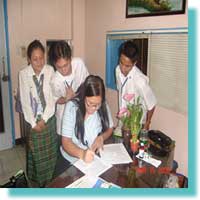 Ms. Alma Miranda Roxas DEAF, Inc. Coordinator sign the Service Agreement