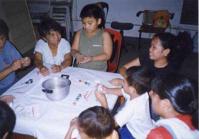 Parents & children enjoying the colors activity.