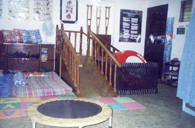 Stairs with slides, trampoline, vestlibular ball for gross motor activities.